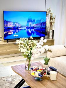 โทรทัศน์และ/หรือระบบความบันเทิงของ the paradise +6 ภาพ