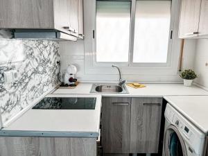 Foto dalla galleria di Coma-ruga central beach apartment a Comarruga Altre 7 foto