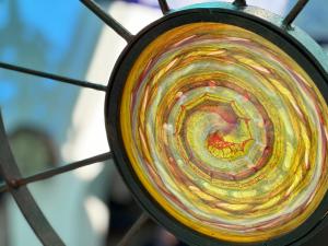 a close up of a drum with a painting on it at Hostal Casa Alborada in Conil de la Frontera