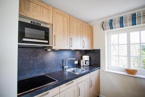 Kuchyň nebo kuchyňský kout v ubytování Taal Huis 1b + 3 fotografie