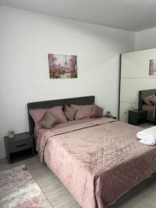 Ένα ή περισσότερα κρεβάτια σε δωμάτιο στο Apartament sector 5 Sara