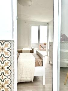 Cama o camas de una habitación en Casa Caladero