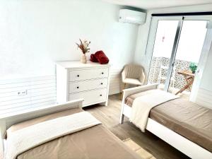 Cama o camas de una habitación en Casa Caladero