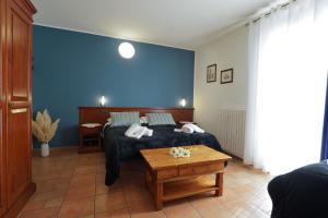 Postel nebo postele na pokoji v ubytování Camere il Cantico