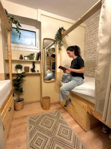 Uma cama ou camas num quarto em Baloo Hostel