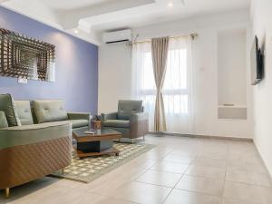 TV a/nebo společenská místnost v ubytování MANOU HOTEL