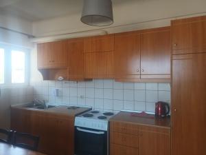 A kitchen or kitchenette at Cathrin Beach Apartments