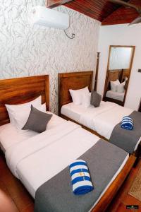 Letto o letti in una camera di Nature World Jungle Paradise