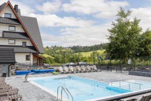 Πισίνα στο ή κοντά στο Domki Gawra z Jacuzzi