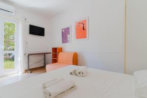 Postel nebo postele na pokoji v ubytování Core Resort + 37 fotografií