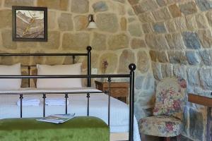 Postel nebo postele na pokoji v ubytování Stone Cellars