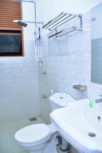 Koupelna v ubytování Ez Stay Guesthouse