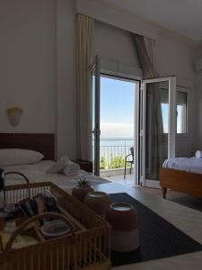 Postel nebo postele na pokoji v ubytování Bora Bora Pydna Hotel