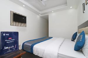 Ένα ή περισσότερα κρεβάτια σε δωμάτιο στο Super Hotel O Sweet Palace