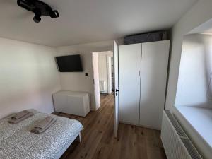 Postel nebo postele na pokoji v ubytování U Paňmamky
