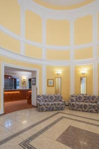 Posezení v ubytování Hotel Flora