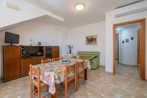 TV a/nebo společenská místnost v ubytování Casa di Lorenzo