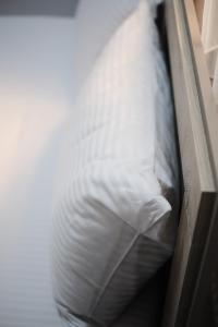 Postel nebo postele na pokoji v ubytování Loft Family Hotel + 37 fotografií