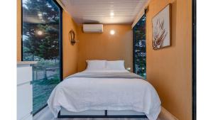 Katil atau katil-katil dalam bilik di Tiny House Big View 1 by Tiny Away