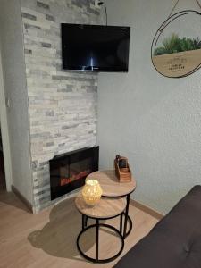 TV a/nebo společenská místnost v ubytování Studio 4P Les orres 1650