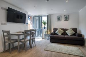 Et tv og/eller underholdning på Welcome Lodge - 1 Bedroom Cottage - Llanrhidian