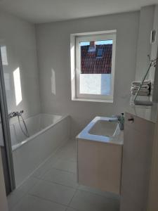 Ένα μπάνιο στο Stylische Penthouse Wohnung