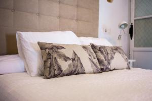 Postel nebo postele na pokoji v ubytování Casa Cuesta Belén