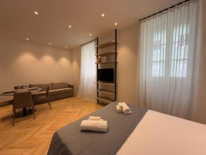 Кровать или кровати в номере Palazzo Machiavelli Trieste