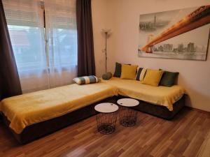 Łóżko lub łóżka w pokoju w obiekcie Zentral gelegene, sehr ruhige und helle Wohnung