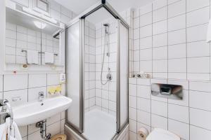 Koupelna v ubytování Hotel Garni Nuss