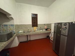 Kuchyň nebo kuchyňský kout v ubytování Moonlight surf hostel + 19 fotografií