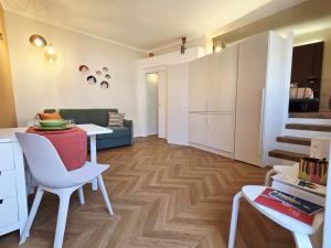 a living room with a couch and a table at La dimora del figulo in Rutigliano