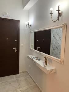 Ένα μπάνιο στο F K Apartments +68 φωτογραφίες