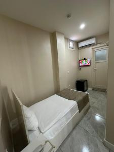 TV a/nebo společenská místnost v ubytování Rota Star Hotel Beyoğlu + 22 fotografií