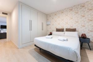 A bed or beds in a room at BHost - The Special One