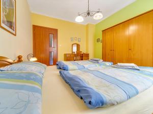 Posteľ alebo postele v izbe v ubytovaní Apartment Nad Łomniczką-3 by Interhome