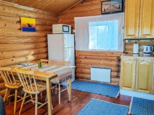 Køkken eller tekøkken på Holiday Home Ainola by Interhome