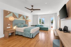 Telewizja i/lub zestaw kina domowego w obiekcie Hotel Palia Dolce Farniente 3 Sup