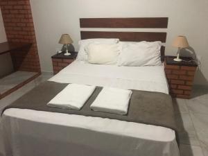 Ένα ή περισσότερα κρεβάτια σε δωμάτιο στο 4let Saint Jhon Peró