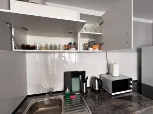 Kuchyň nebo kuchyňský kout v ubytování Centrum Pańska3 Apartment PARKING