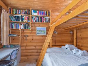 Postel nebo postele na pokoji v ubytování Holiday Home Rohtuluppo by Interhome