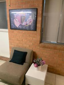 a living room with a couch and a table at 76 Companion Crescent in Higgins