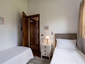 A bed or beds in a room at Villa Monica by Interhome