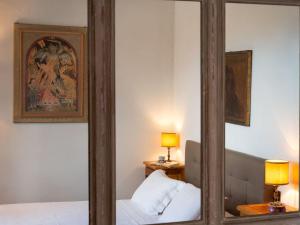 A bed or beds in a room at Villa Monica by Interhome