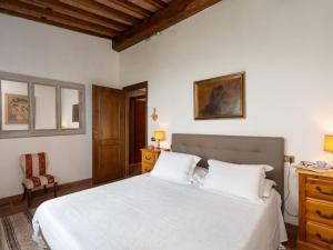 A bed or beds in a room at Villa Monica by Interhome