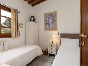 A bed or beds in a room at Villa Monica by Interhome