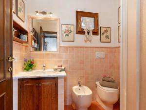 A bathroom at Villa Monica by Interhome