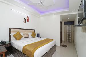 Postel nebo postele na pokoji v ubytování Super Hotel O Sweet Palace + 14 fotografií