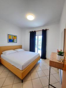 Amarildo Hotel客房内的一张或多张床位
