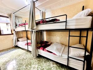 Letto o letti in una camera di Atlas Hostel Taghazout
